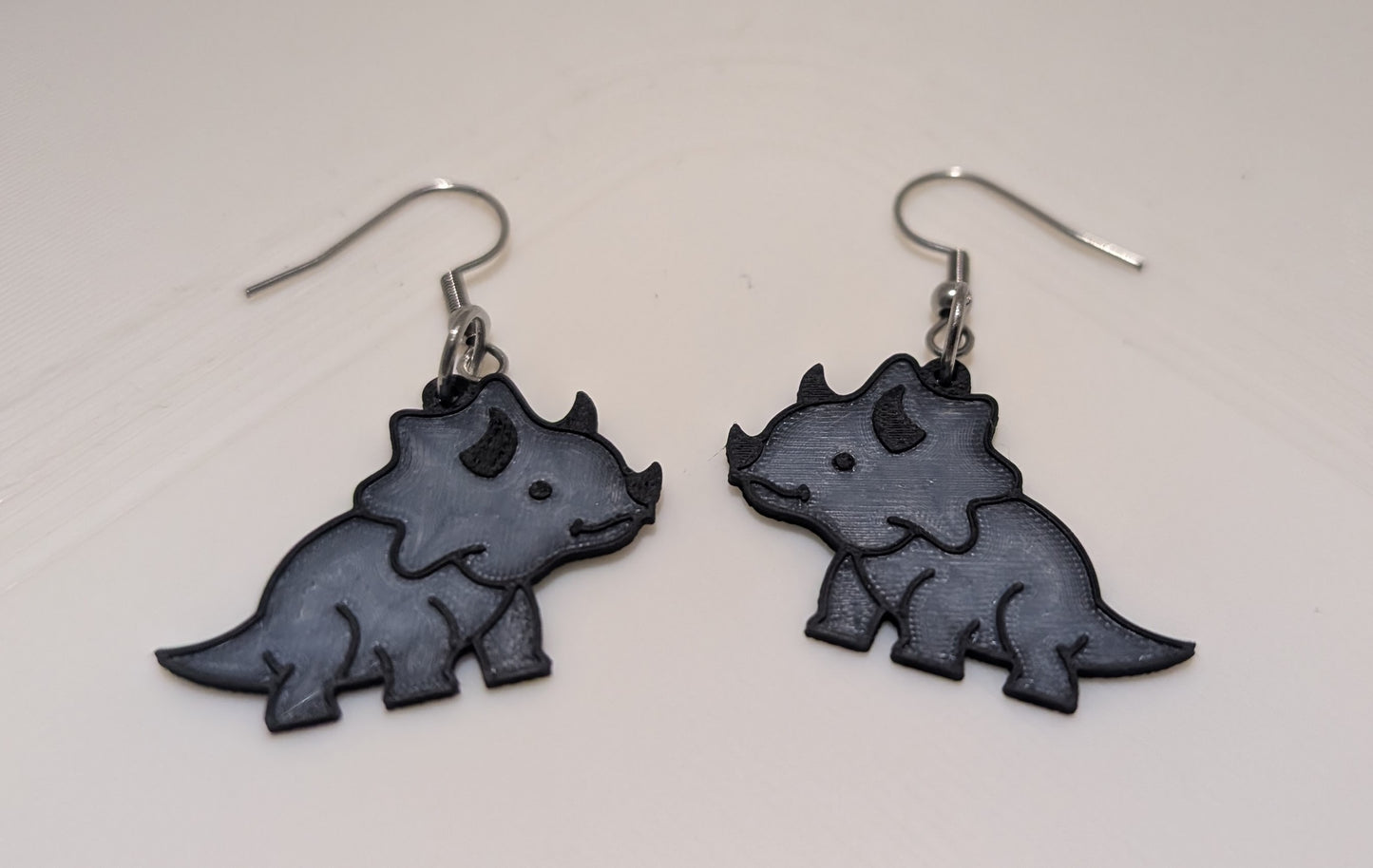 Triceratops earrings